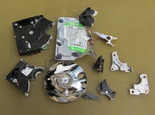 File:Damaged Hard disk drive for data protection .JPG